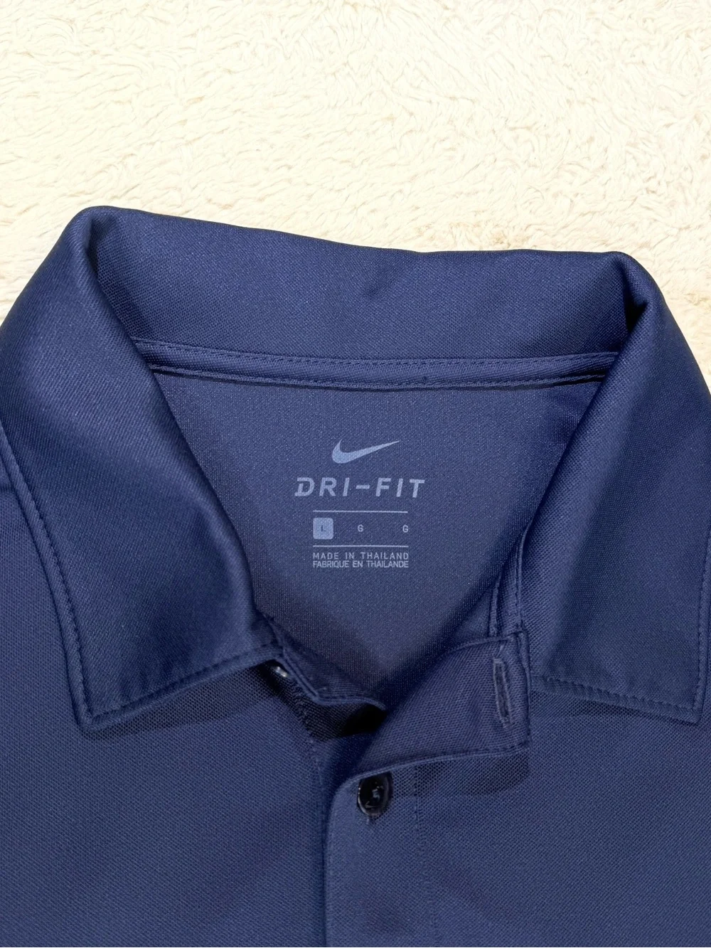 Nike DRI-FIT golf polo size large in navy blue